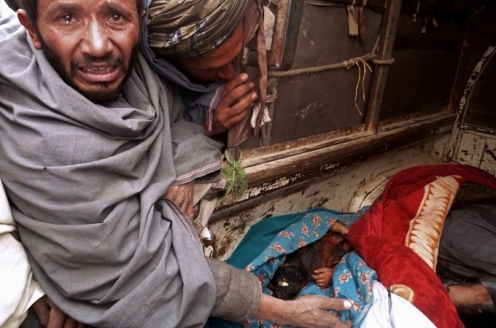 AFP photo of grieving father Afghanistan